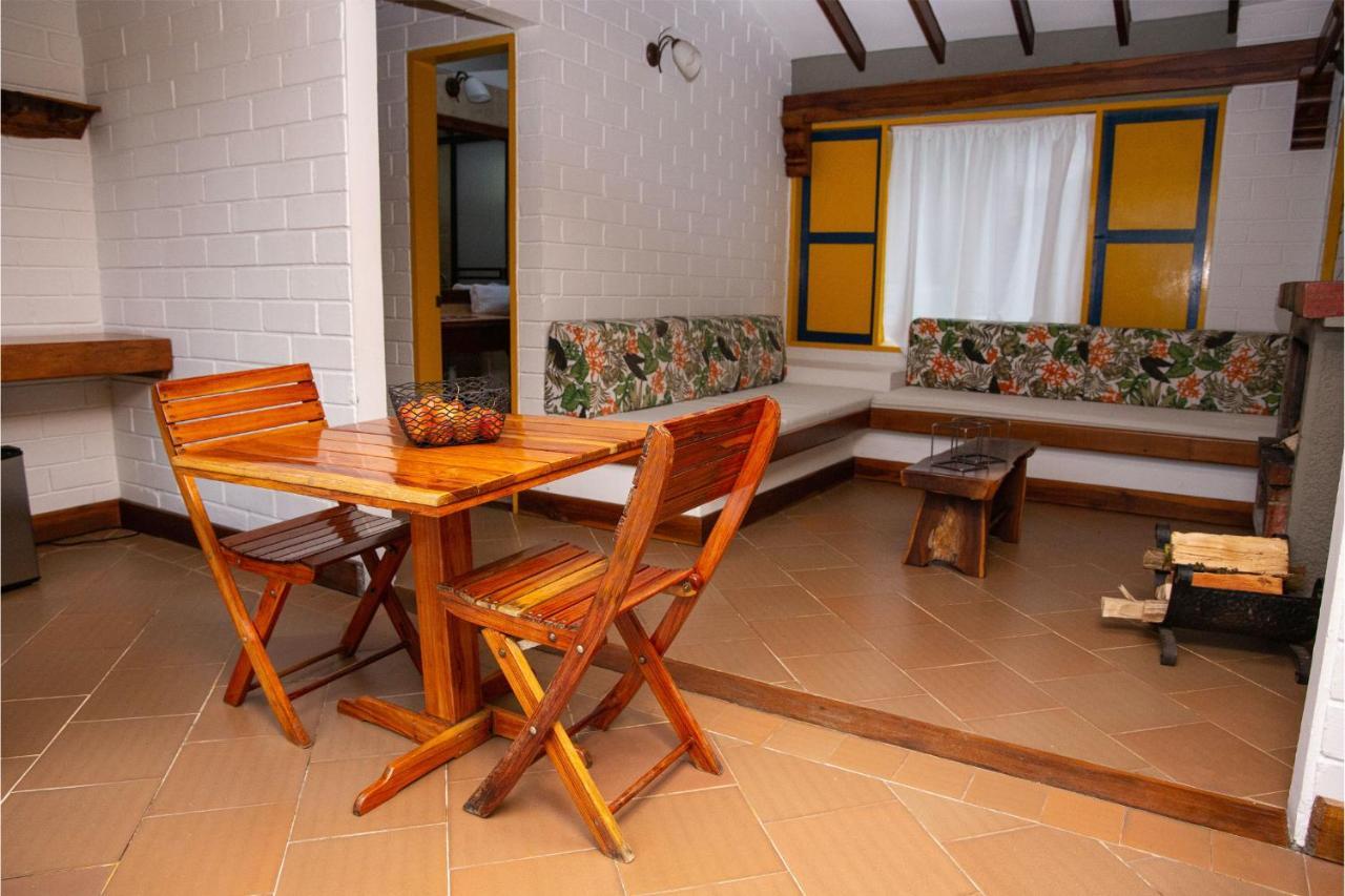 Termales El Otono Hotel Manizales Bagian luar foto Interior of a guest room at the hotel